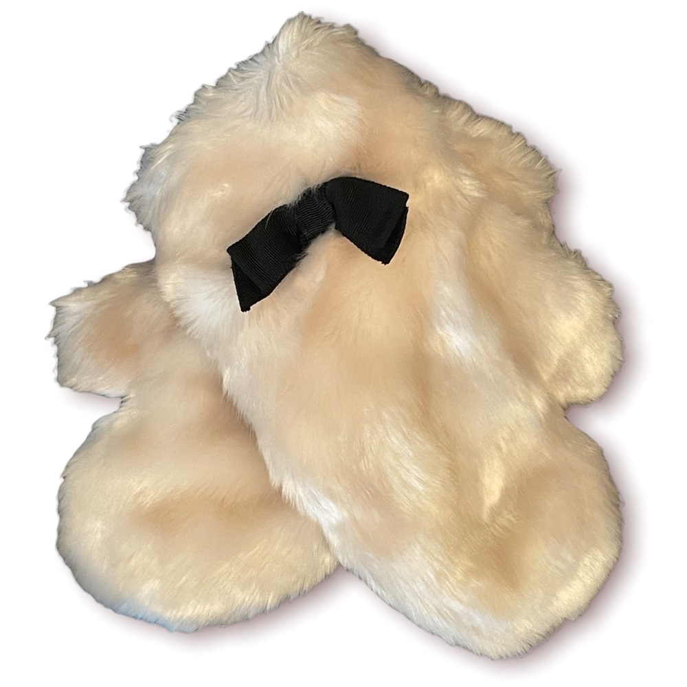 Never worn faux fur mittens with black bow detail.